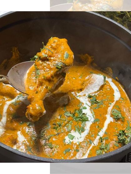 A spoonful of our creamy butter chicken, showcasing the tender chicken leg and rich, velvety gravy. A timeless classic that is always a crowd-pleaser.