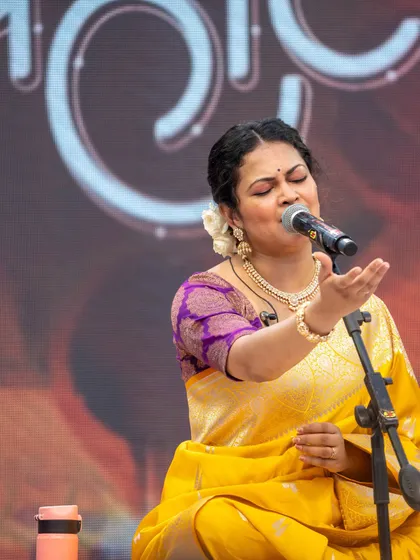 Priyanka Barve lost in her performance, with the rich colors of her outfit shining under the stage lights.