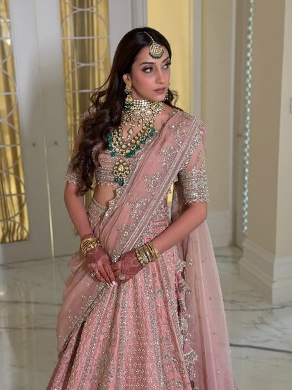 A full-length portrait showcasing the stunning Anushree Reddy design and the overall grace of the look.