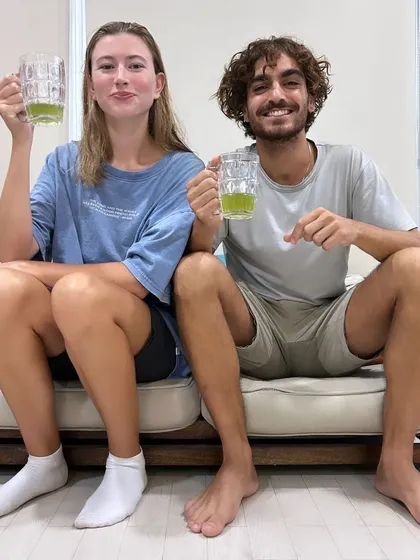 That post-float feeling. This couple is seen relaxing with a refreshing drink after their shared experience in our sensory deprivation tank, a session designed to reduce stress and deepen connection.