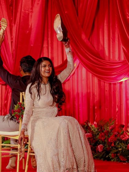 The classic shoe game is always a hit at a Sangeet. I love incorporating fun, interactive games that get guests laughing and reveal sweet and funny stories about the couple.