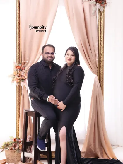 The couple poses together for a happy portrait. This setup is versatile and can be styled to feel both classic and modern.