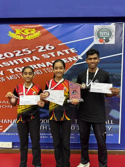 A group of our talented medalists, Saisha Madhur, Mahika Susvirkar, and Shivam Vidhate, posing with their certificates and trophies after a successful Khar Gymkhana State Tournament.