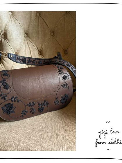 Aaniya from Delhi with her custom Gigi bag. She chose to have our Black Lace embroidery on an Oak leather base, complete with a matching embroidered sling.