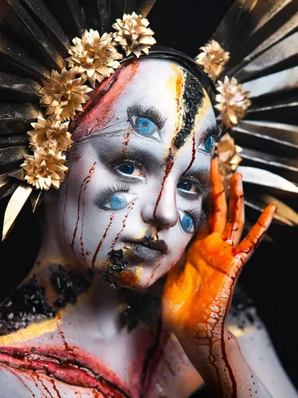 A close-up of the Halloween illusion makeup, highlighting the hand-painted details and the gory, bloody effects.