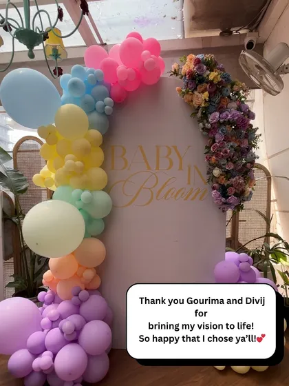 "Thank you for bringing my vision to life!" A testimonial from a happy client after we created her "Baby in Bloom" shower with a rainbow of balloons and flowers.