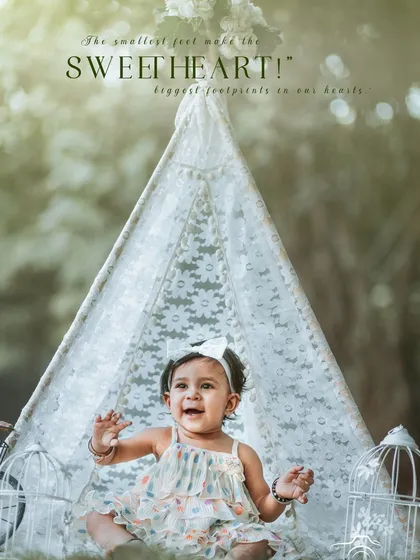 The sweetest feet make the biggest footprints in our hearts. A joyful baby girl in our popular outdoor teepee setup.