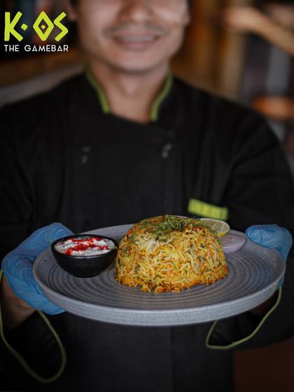 Served with a smile. Our chefs take pride in plating every dish to perfection, ready to be enjoyed by you.
