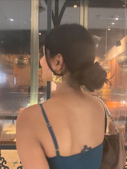 A look at the back details, showing my low bun and the simple lines of the dress. Sometimes, less is more.