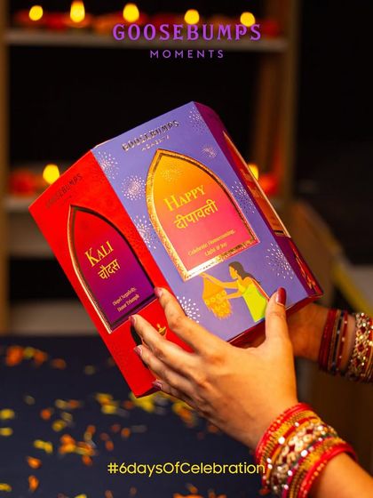 This view of the hexagon box shows the windows for Kali Chaudas and Happy Diwali. The design allows you to celebrate the entire festival week, one day and one treat at a time.