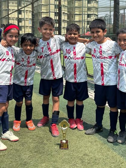 Another angle of our U7 stars, smiling and united even after a challenging match. This shows their positive mindset.