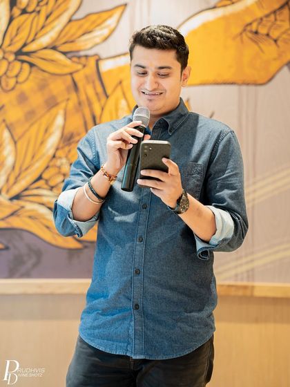 A poet shares his patriotic verses. The event buzzed with energy as poets shared works that resonated with the theme.