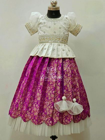 Another view of the white and purple Banarasi lehenga, perfect for special events.