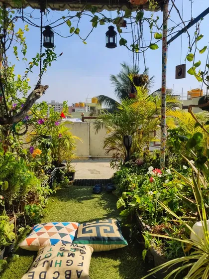 A garden is a space to be lived in. I design cozy seating nooks like this one, perfect for your morning tea or simply sitting quietly among the plants on a sunny Bangalore afternoon.