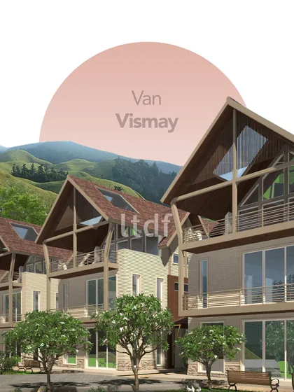 For the 'Van Vismay' project in a hilly region, we employed a climate-responsive design. The pitched roofs are a functional necessity that also adds to the vernacular aesthetic, proving that practical design can be beautiful.