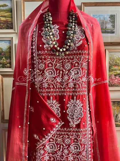 A full-length view of the mannequin, capturing the entire regal ensemble.