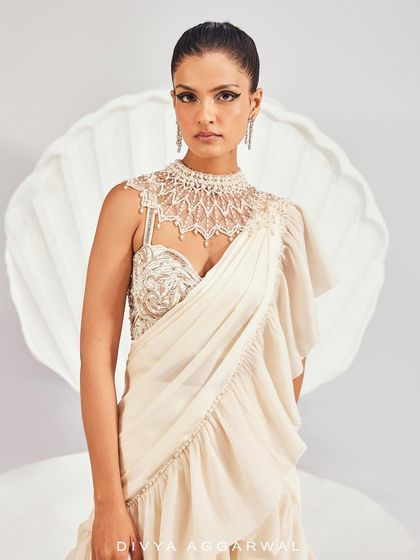 A close-up of the Kairi Saree Set's blouse, where pearl and crystal embellishments create a breathtaking, jewelry-like effect.