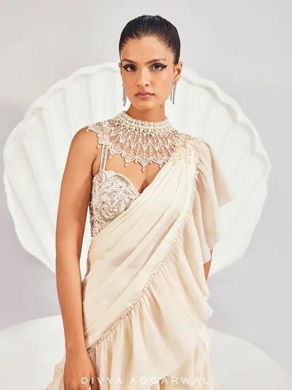 A close-up of the Kairi Saree Set's blouse, where pearl and crystal embellishments create a breathtaking, jewelry-like effect.