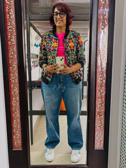 Had the best day at the office with a fun cricket match. I kept it comfy and casual in my favorite jeans, a cute crop top, and this colorful jacket that goes with everything.