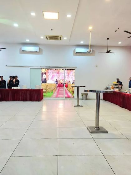 The separate dining area at Synergy Banquet in Vashi, set up with buffet counters. This ensures your main event hall remains clean while guests enjoy a wide spread of delicious pure veg food.