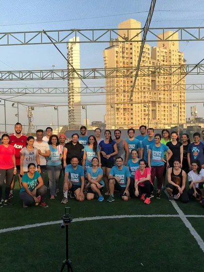 A group photo from one of our outdoor bootcamps. The smiles on everyone's faces show the positive and supportive atmosphere we cultivate.