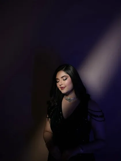 An artistic portrait of my engagement bride. The dramatic lighting highlights the flawless makeup, showing how a soft glam look can also be incredibly striking and photogenic.