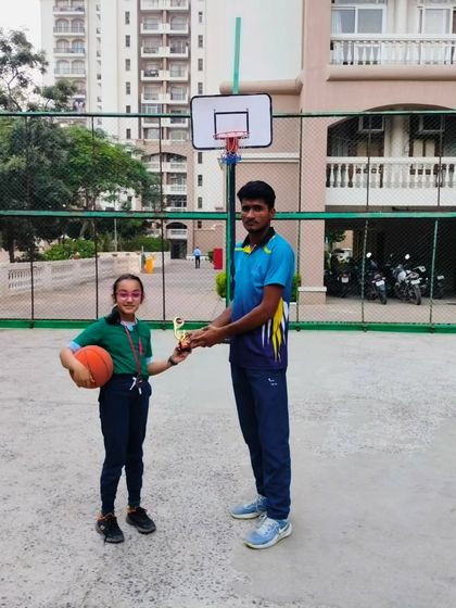 This young girl earned her trophy through hard work and focus during the Ranking Day drills. It's rewarding to see their dedication pay off.