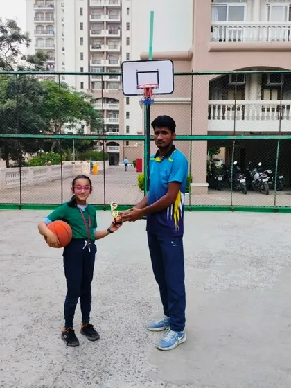 This young girl earned her trophy through hard work and focus during the Ranking Day drills. It's rewarding to see their dedication pay off.