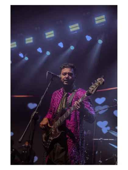 Our bassist, looking sharp and focused during the corporate gig.