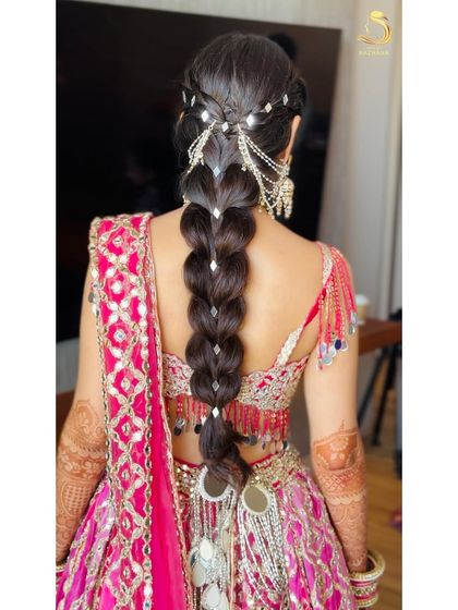 A detailed close-up of the mirror-work braid, showing the craftsmanship involved.