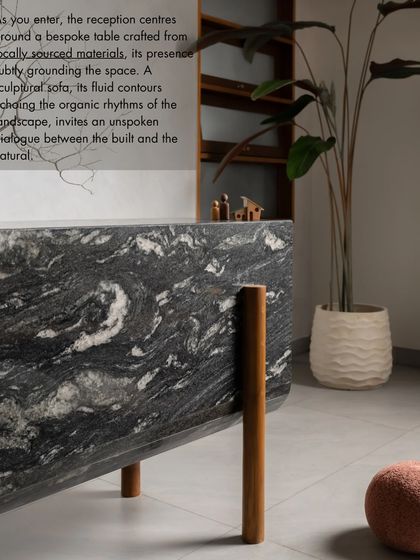 A quote from our feature in ArchDigest, describing the bespoke, locally sourced materials used in our studio's reception area.