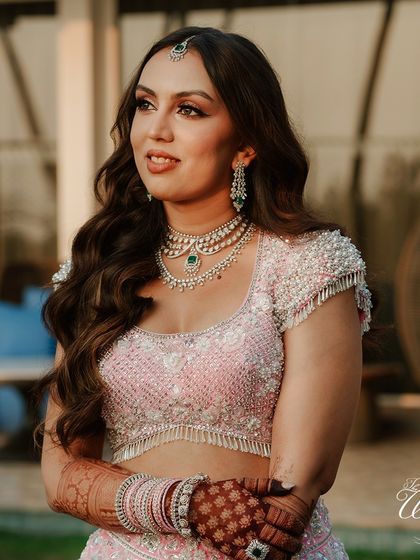 The bride looking absolutely radiant. I coordinate with the best makeup artists and stylists to ensure my brides look and feel their absolute best on their wedding day.