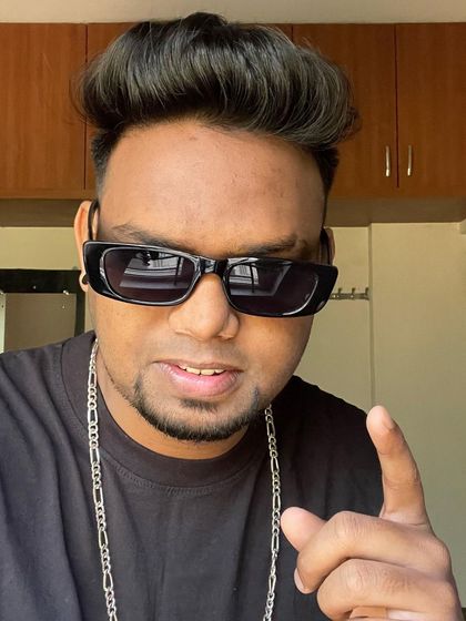 A direct, confident look. As a DJ, I'm in control of the room's emotions, and I take that responsibility seriously to ensure everyone has a great time.