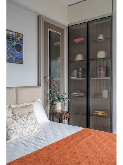 A view of the display cabinet without the internal light, showing how the fluted glass provides a subtle, sophisticated look.