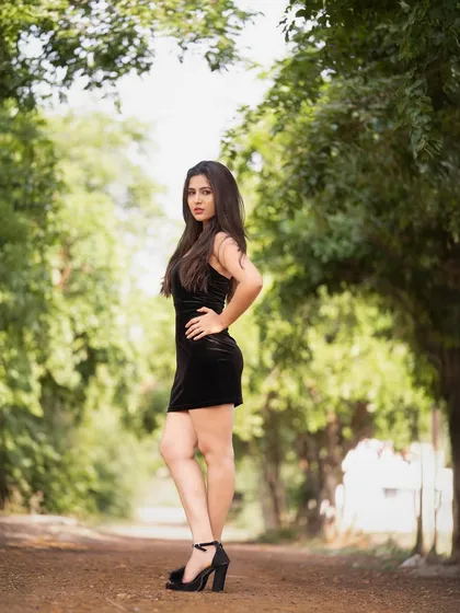 Another full-length shot of Apurva, this time from a different angle to highlight her profile.