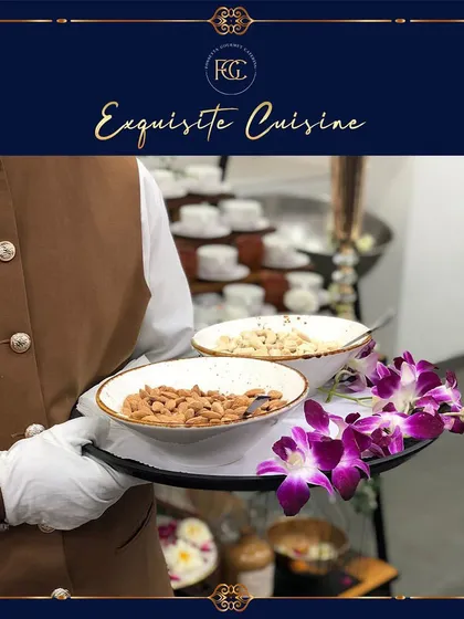 Bowls of premium almonds and cashews being served on a tray. This simple yet elegant offering is a perfect accompaniment to drinks at the start of an event.