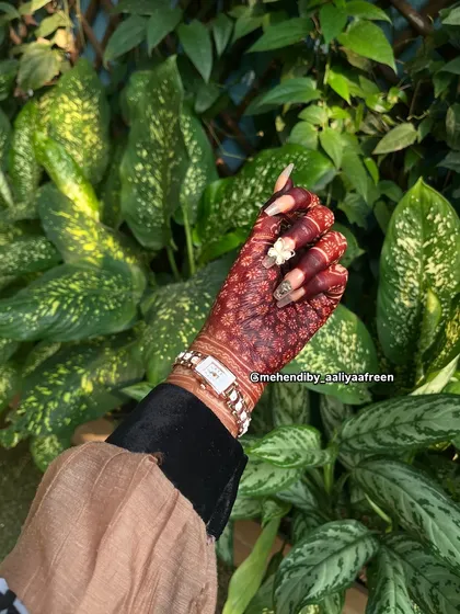 A close-up of the rich, dark henna stain, a result of my special homemade paste.