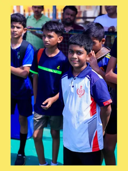 A young player at our summer camp, happy to be on the court. Our camps are filled with sunshine, volleyball, and smiles.