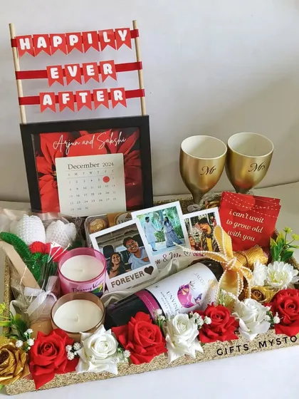 The complete wedding day hamper, beautifully arranged on a decorative tray. It's the perfect gift for a partner on your special day.