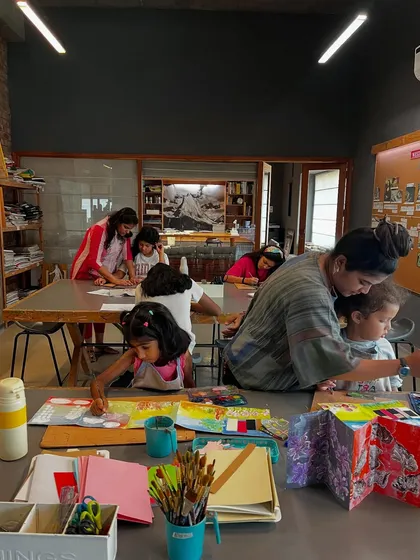 A wide view of our summer camp in full swing. You can see the focus and collaboration as students work on their individual artist books, with instructors providing guidance.