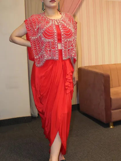 This red draped skirt set is one of the highlights of our 'DESIRE' collection.