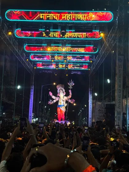 My LED banners are fully customizable with your Mandal's name, like this one for 'Manacha Mahaganpati'. The bright, clear text is visible from a distance, day or night, adding a professional and personalized touch to the procession.
