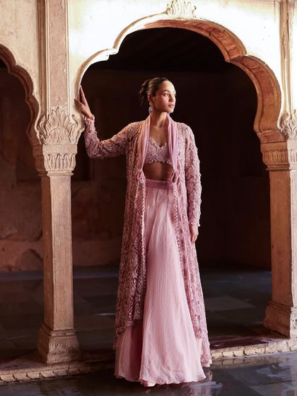 For this look, I styled a delicate embroidered jacket over a matching bralette and skirt. The goal was to create a layered, elegant silhouette that felt both traditional and modern for a bridal campaign.