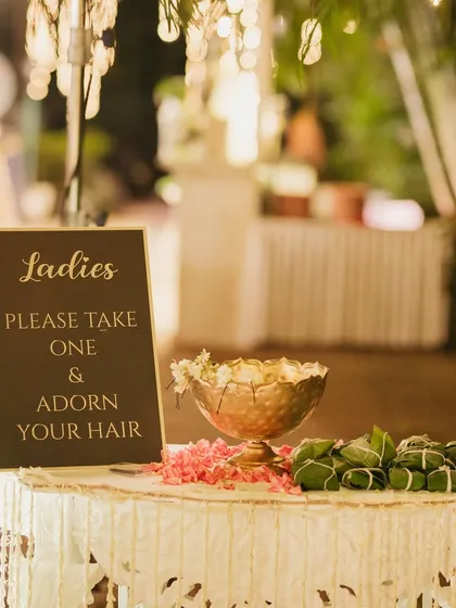 It's the thoughtful details that make an event special. For this milestone celebration, I set up a small station with fresh gajra for the ladies to adorn their hair, adding a traditional and personal touch to the party.