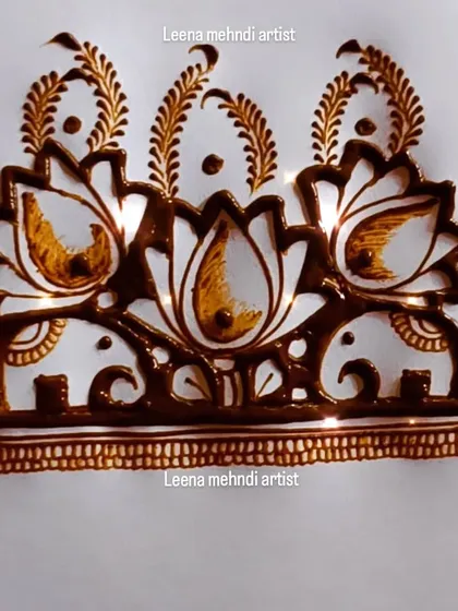 A beautiful motif featuring three lotuses and two small elephants, perfect for a cuff or central piece.