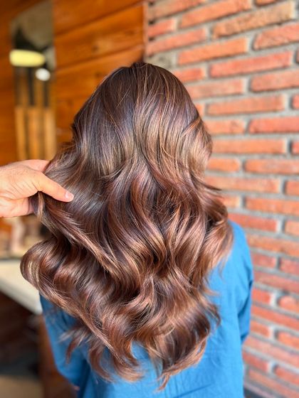 This rich chocolate brown colour is always in high demand. It’s a timeless and elegant shade that adds incredible depth and gloss to the hair.