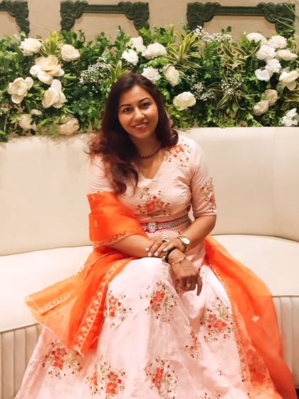 A relaxed pose on a couch against a backdrop of flowers. I always feel at home in a beautifully decorated venue.