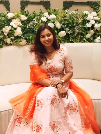 A relaxed pose on a couch against a backdrop of flowers. I always feel at home in a beautifully decorated venue.