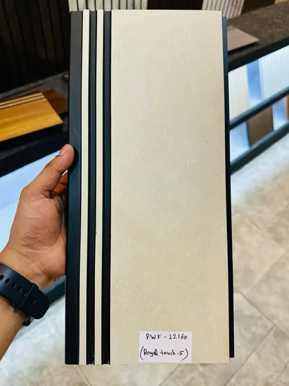A close-up of our new pattern fluted panel. This design features a royal touch with a cream-colored textured surface and elegant black grooves.