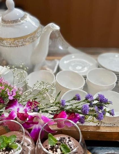 My dessert and kahwa platter is perfect for special occasions. It includes a variety of sweets and a pot of fragrant kahwa, served in elegant crockery.